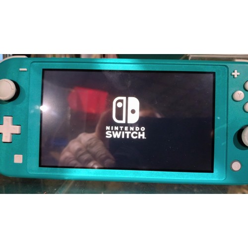 2526 - A Nintendo switch Lite console, boxed with charger & comes with an official Nintendo soft carry case... 