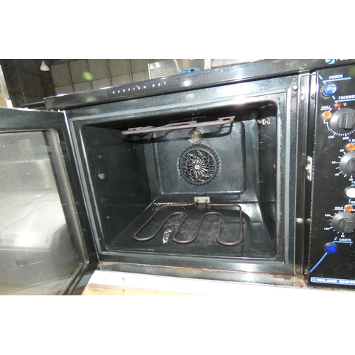 1267 - A commercial stainless steel turbo fan oven by Blue Seal -31, missing shelves 240v - requires attent... 