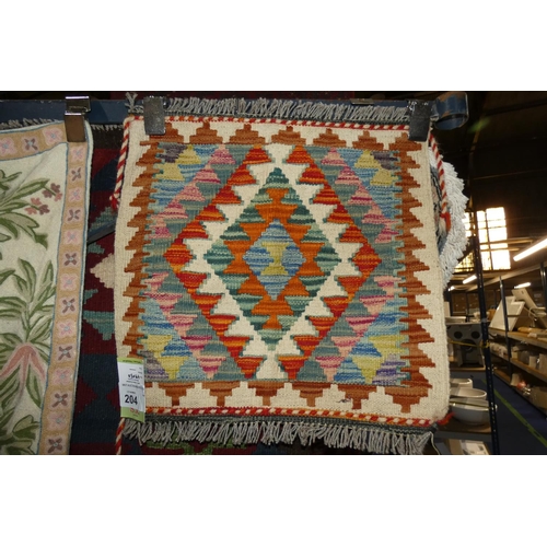 204 - A chobi kilim rug approx 49 x 50cm