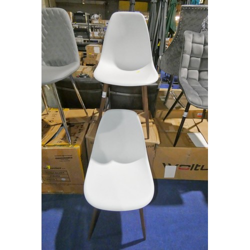 517 - 4 x Dorel white plastic dining chairs