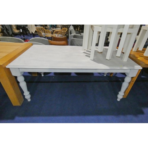 522 - A white painted pine farm house table approx 183 x 100cm. Please note that this table has a damaged ... 