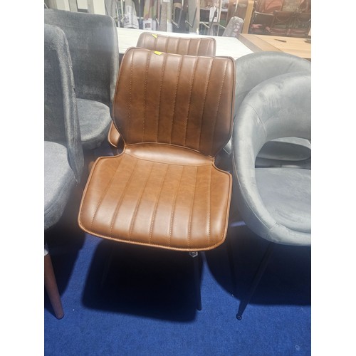 490 - 2 x light brown upholstered dining chairs