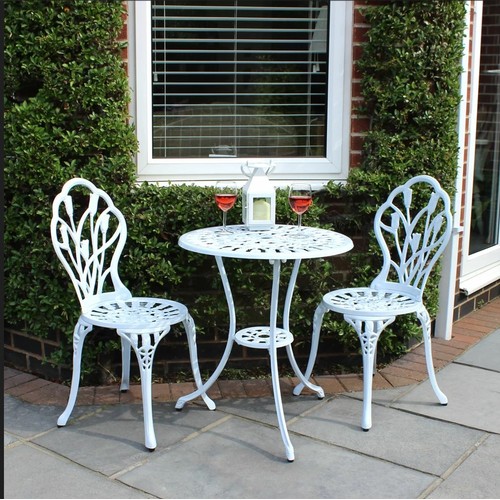 387 - A Charles Bentley cast aluminium tulip bistro set for two people in white comprising of 2 x chairs a... 