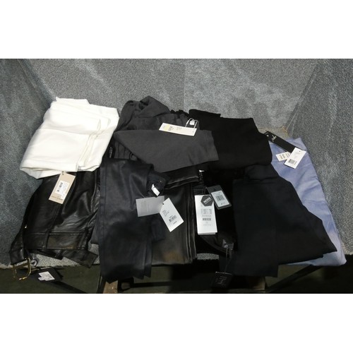 2412 - A quantity of ladies trousers in various sizes / types. Not practical to list in detail so please vi... 