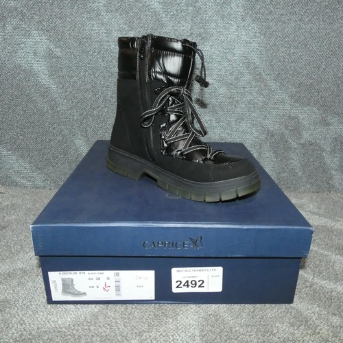 2492 - A pair of ladies boots by Caprice type Black Comb size 5 RRP £84