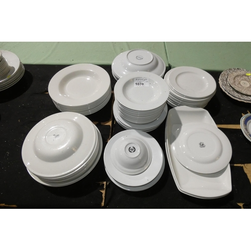 1070 - A quantity of white crockery by Churchill, Apollo, China Craft, Steelite