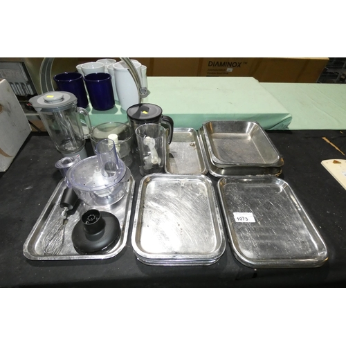 1073 - A quantity of various food processor attachments inc Kenwood and a quantity of stainless steel trays