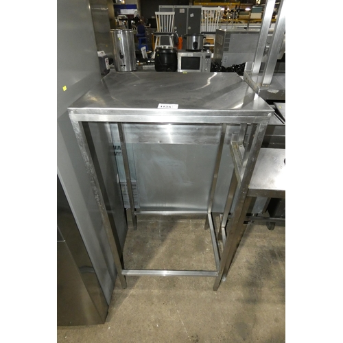 1135 - A tall commercial stainless steel catering type table approx 67x54x130cm, with open space beneath