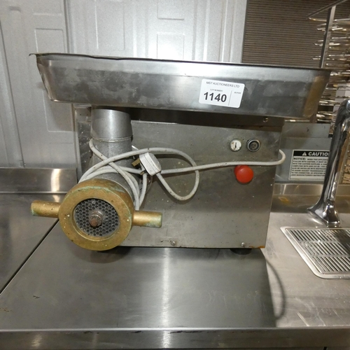 1140 - A commercial stainless steel electric meat mincer by Koneteollisuus. Requires attention.