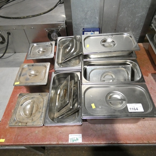 1164 - A quantity of commercial stainless steel gastronorm pots with lids, various sizes