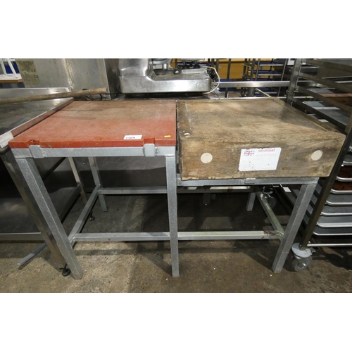 1169 - A commercial catering type table with 2 chopping board tops, 1 plastic, 1 wooden approx 124x63cm