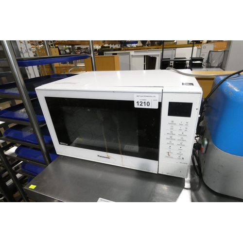 1210 - WITHDRAWN A microwave oven by Panasonic type NN-CT55JW trade  *** door broken