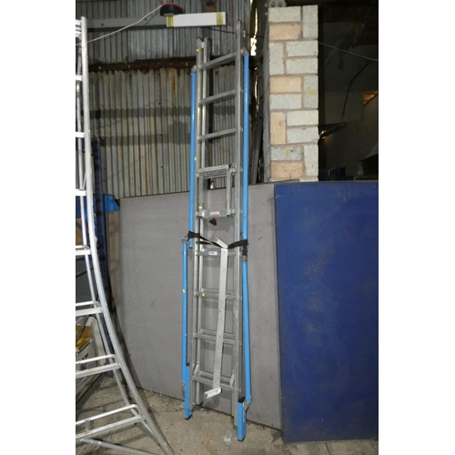 2068 - A double extending aluminium ladder with various accessories (2 x 9 rung)