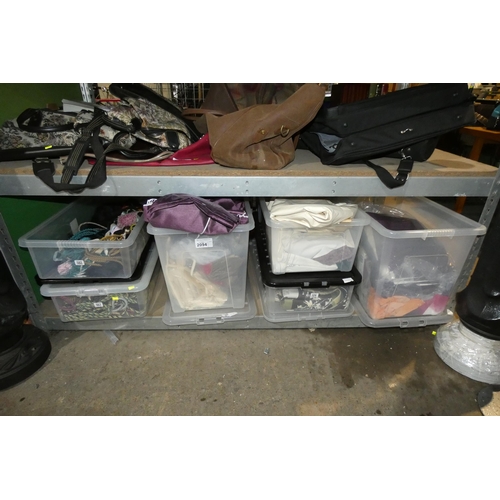 2094 - A quantity of various curtains. Contents of 1 shelf and please note that the plastic crates are incl... 