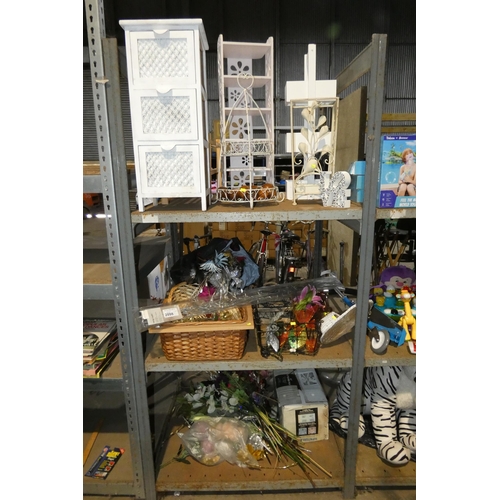 2098 - A quantity of various items including artificial flowers etc. Contents of 1 bay / 3 shelves