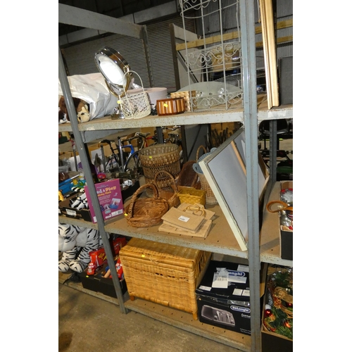 2100 - A quantity of various items including baskets, a light 240v, a mirror etc. Contents of 1 bay /3 shel... 