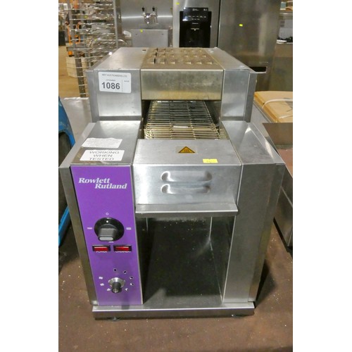 1086 - A commercial stainless steel rotary toaster by Rowlett Rutland. Tested Working