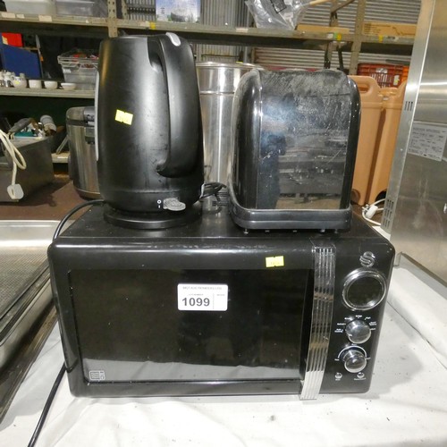 1099 - A black microwave by Swan, toaster and kettle - trade  Tested Working