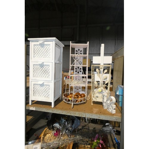 2098 - A quantity of various items including artificial flowers etc. Contents of 1 bay / 3 shelves