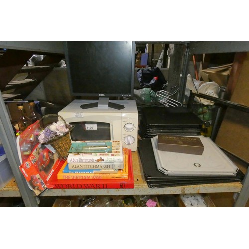 2106 - A quantity of various items including a Russell Hobbs toaster 240v, a Daewoo microwave 240v, glasses... 