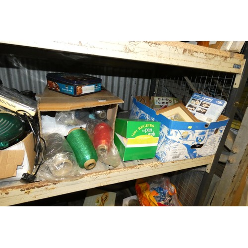 2143 - A quantity of various household items including a Coopers mini vacuum cleaner 240v, DVDs, 220g butan... 