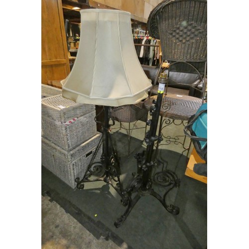 2118 - 2 x ornate black metal tripod floor stands and 2 x light shades