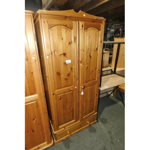 2128 - 1 x Pine two door wardrobe with one drawer below approx 83 x 53 x 182cm high