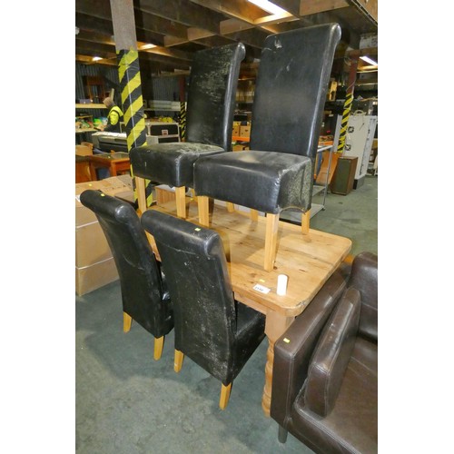 2150 - A Pine dining table approx 138 x 77cm and 4 x black upholstered dining chairs