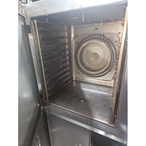 1189 - A Hobart combi oven & stand, cupboard and tray rack, please note one leg requires a repair, also inc... 