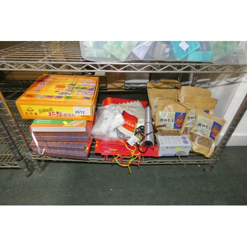 2612 - A quantity of various Chinese items including books, bags etc. Contents of 1 shelf