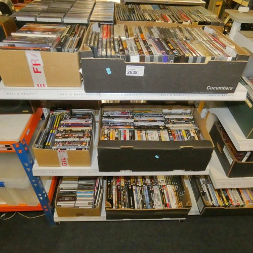 2638 - A large quantity of various DVDs and CDs, contents of 3 shelves