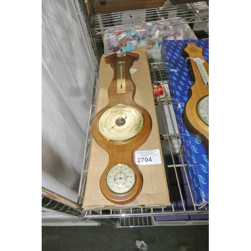 2704 - A wall mounted barometer, RRP £99