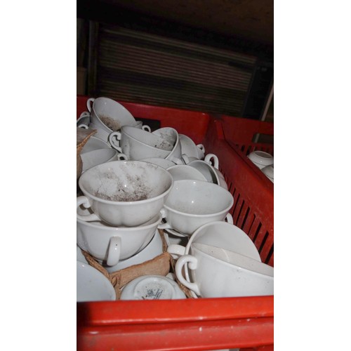 1031 - 4 x crates containing a quantity of Dudson crockery