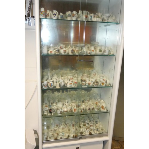 3096 - A large quantity of decorative miniature crested chinaware (5 shelves)