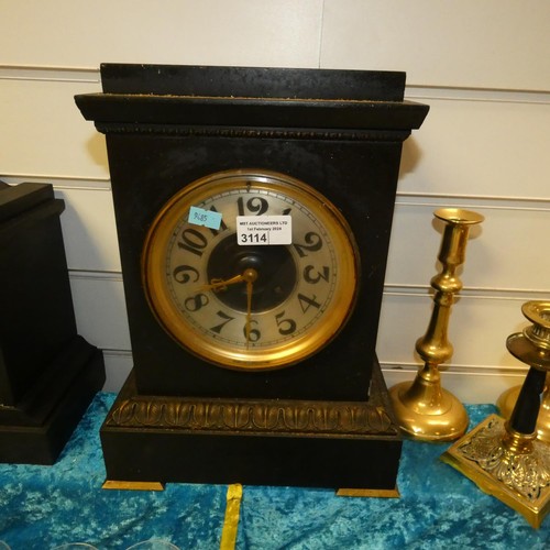 3114 - An Edwardian black marble case mantle clock with a brass decorated dial