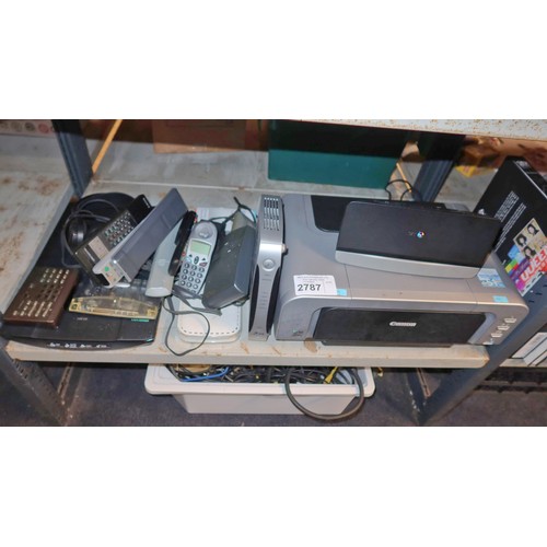 2787 - A quantity of various electronic related items including a printer, routers, scanner etc. Contents o... 