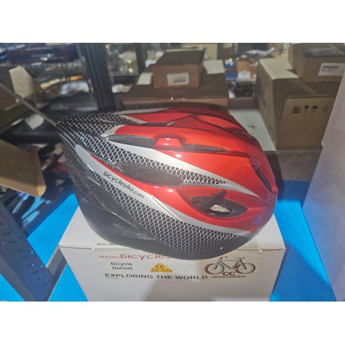 2840 - 2 x unused cycle safety helmets type red Saturn, adjustable 55cm to 59cm