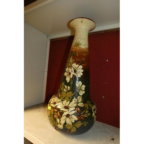 3010 - A large floral patterned pottery vase and a large black and white decorative vase