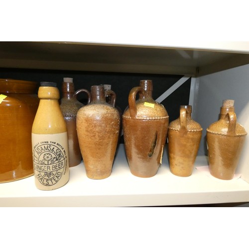 3046 - A quantity of miscellaneous vintage stoneware jars, stoneware water bottles, tankards, jugs and larg... 