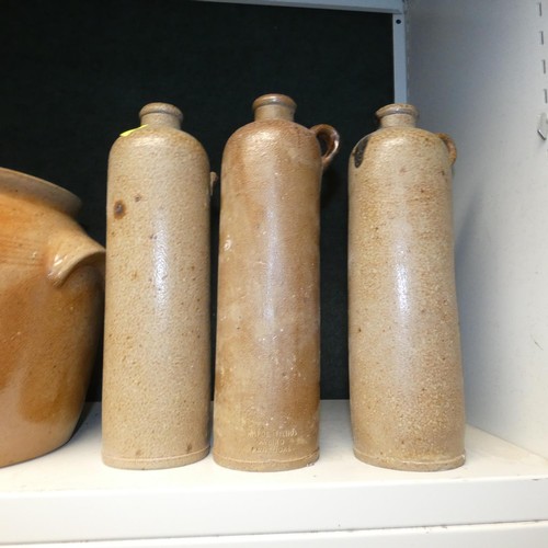 3046 - A quantity of miscellaneous vintage stoneware jars, stoneware water bottles, tankards, jugs and larg... 