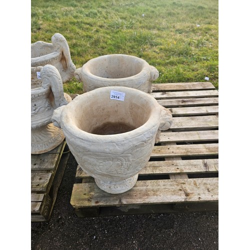 2914 - 2 large goblet style concrete planters