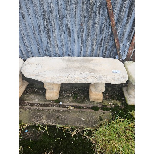 2930 - A wood effect concrete bench on 2 squirrel plinths