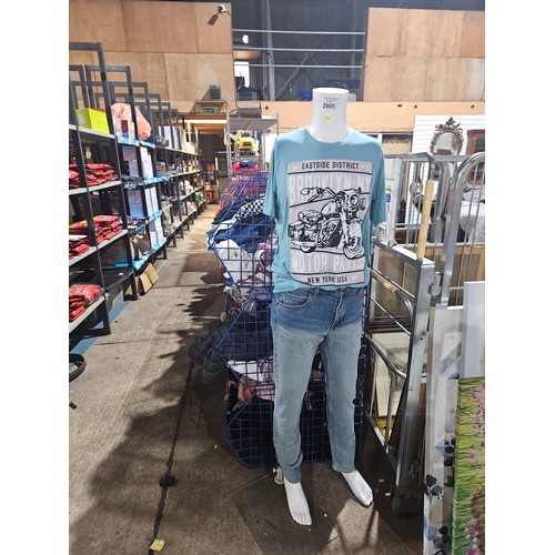 2905 - A full size manikin dressed in jeans and T-shirt