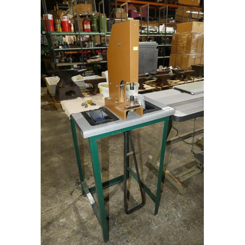 2184 - A foot operated eyelet press machine with stand, various tooling and accessories