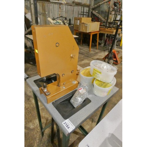 2184 - A foot operated eyelet press machine with stand, various tooling and accessories