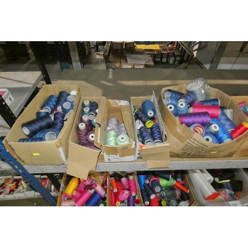 2194 - A quantity of various spools of sewing threads. Contents of 1 wide shelf