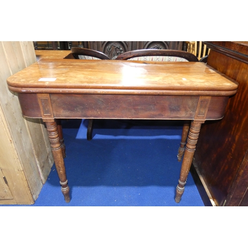 3359 - A 19th Century mahogany rectangular topped fold over tea table on turned legs