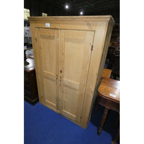 3360 - A vintage pine floor standing cabinet with two panelled doors, approximately 107 cm wide