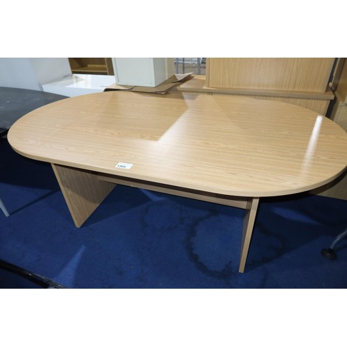 1305 - 1 x wood effect oval meeting room table approx 180 x 100cm - Please note that the top requires reatt... 