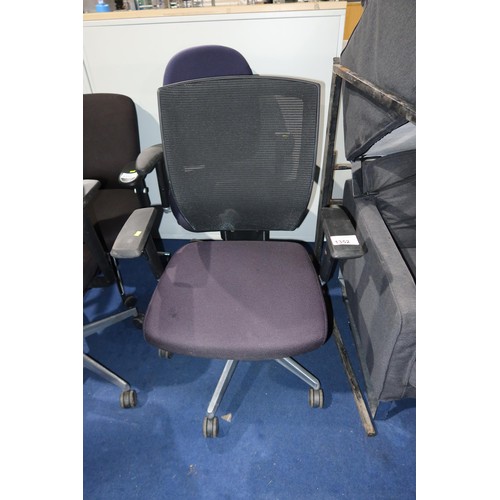 1352 - 1 x black upholstered office swivel chair with black mesh back panel